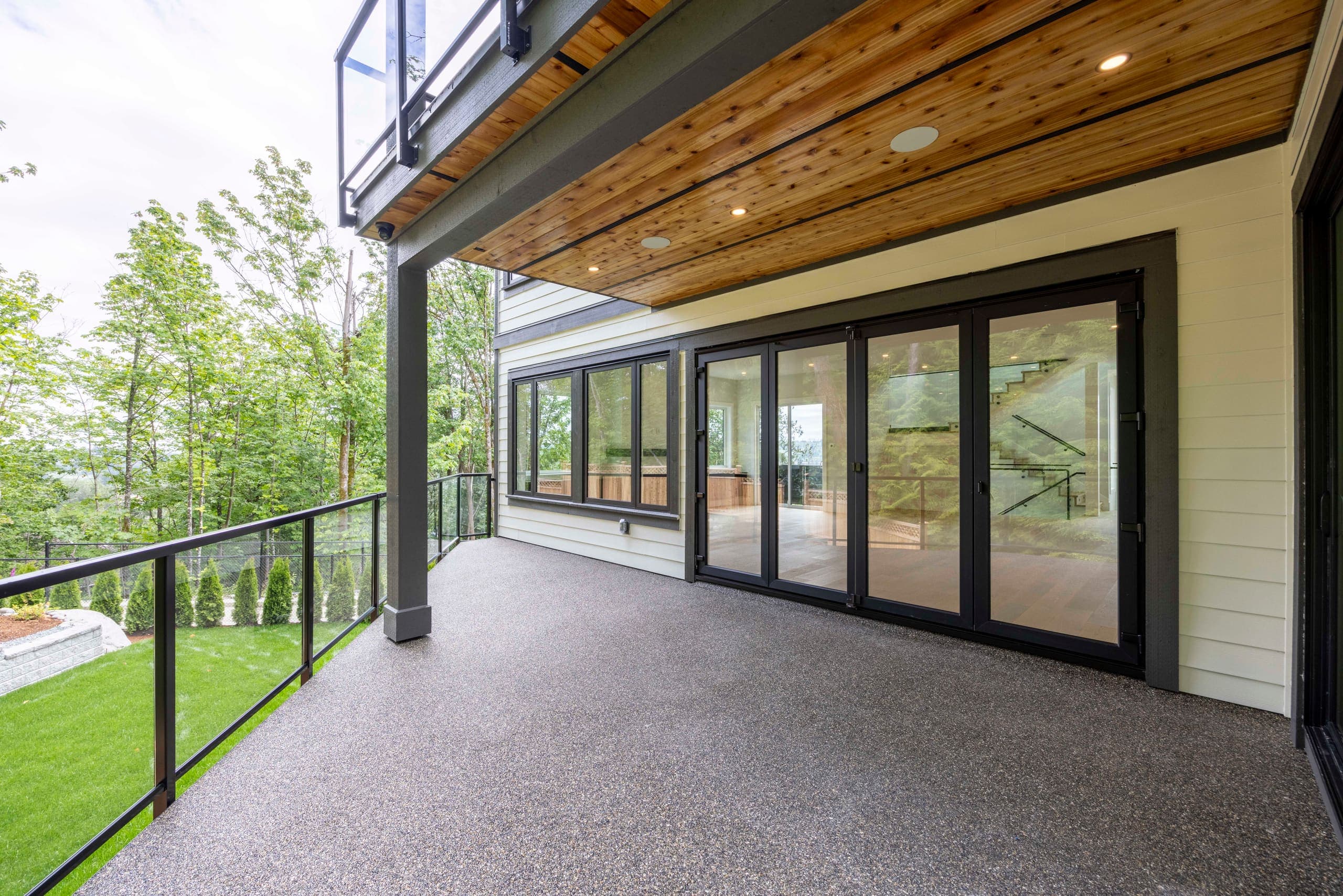 Covered deck with cedar soffit, opening off the main floor — The Monashee House