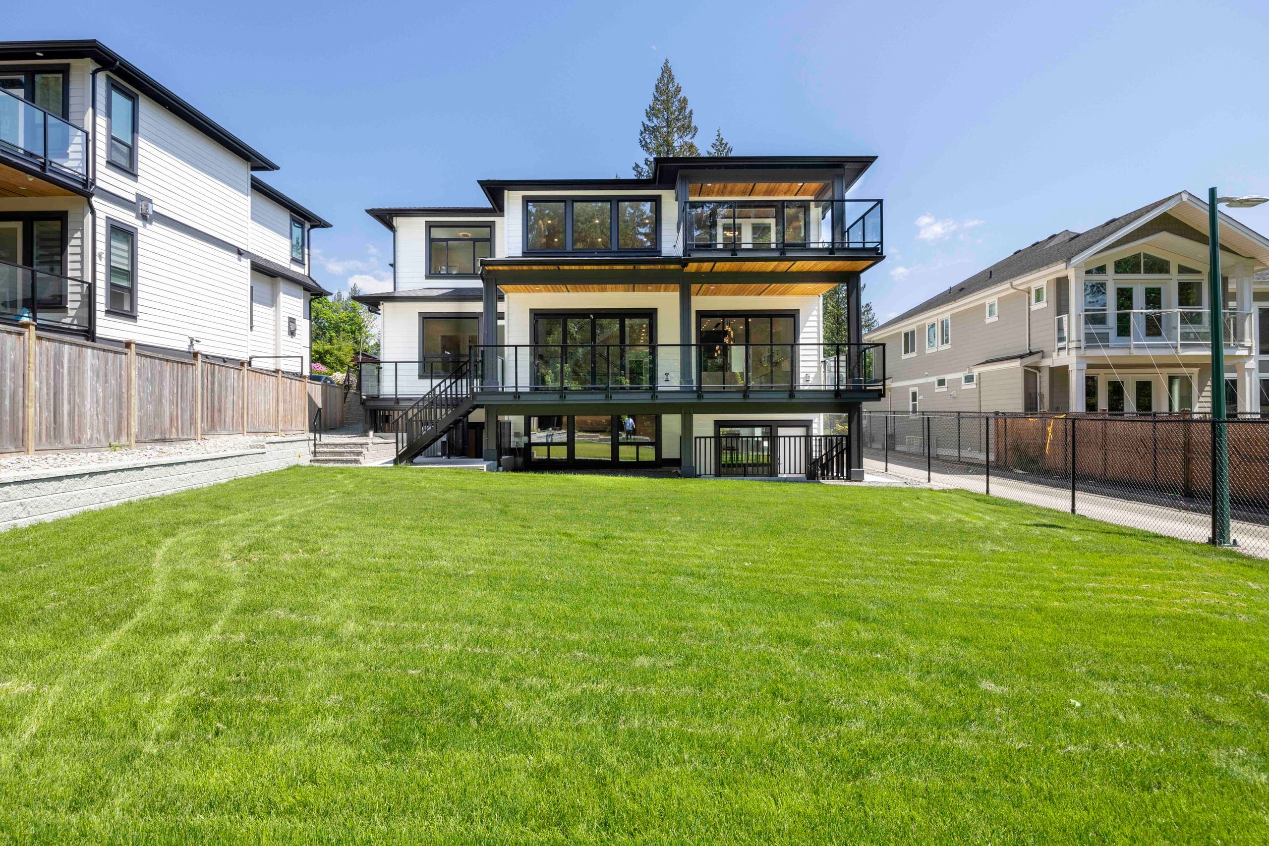 Rear elevation and lawn — The Ridge House